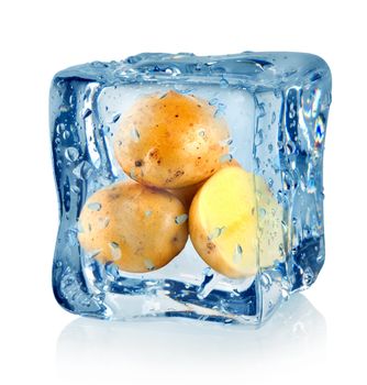 Ice cube and potato isolated on a white background
