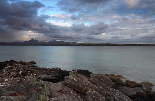  Sunset over Gailoch peninsular over looking Ben Eighe