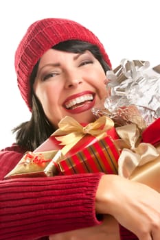 Happy Attractive Woman Holding a Holiday Gift Isolated on a White Background.