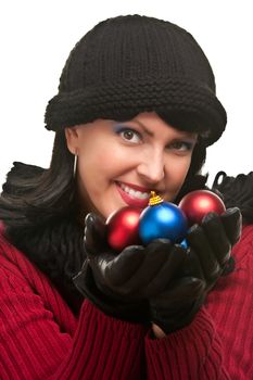 Attractive Woman Holding Christmas Ornaments Isolated on a White Background.