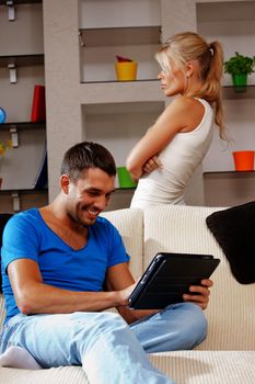 bright picture of couple with tablet PC