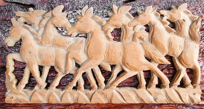Beautiful sculpture of horse made of only one peace of wood