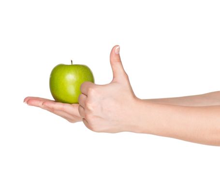 Woman hand with green apple isolated on white background