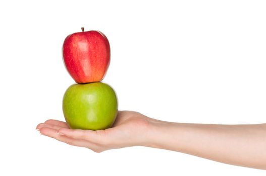 Woman hand with green and red apples isolated on white background