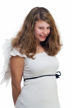 innocence christmas angel with golden hair on white background with wings looking shy