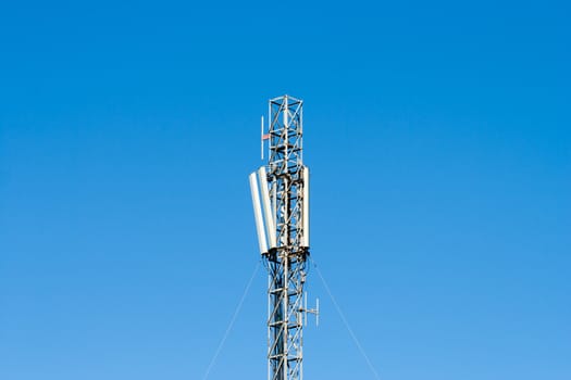mobilt telecom antenna with blue sky