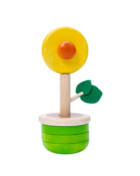 Colorful wooden flower toy vase isolates on white