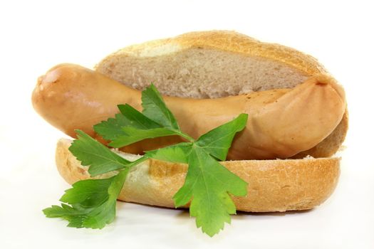 a scalded bockwurst in a sliced bun