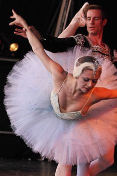 BRISTOL, ENGLAND - August 1: Megan Fairchild and Andrew Veyette of the New York City Ballet perform the White Swan pas de deux from Swan Lake in the Dance Village at the three day Harbour Festival in Bristol, England on August 1, 2010