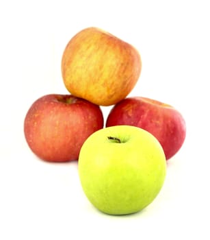 green and red apples on white background