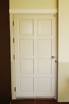 the white wood door in a  house