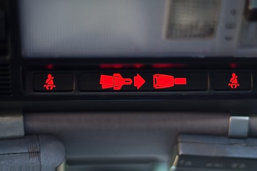 Seat belt warning light blinking on dashboard