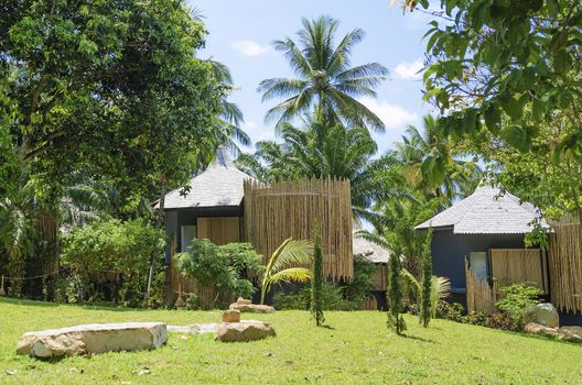 jungle bungalows in tropical resort asia