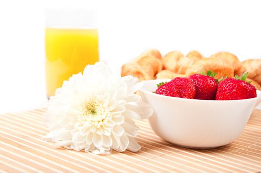 Breakfast with berries,orange juice and croissant, early breakfast