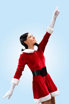 Santa Girl presenting your product, in costume and white gloves