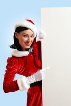 Portrait of a santa girl with a blank banner