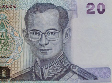 Closeup picture of a twenty Baht bill in Thailand