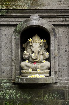 ganesh hindu god figure in bali indonesia temple