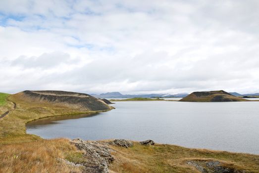 volcanic landscape in iceland interior with volcanos and lake