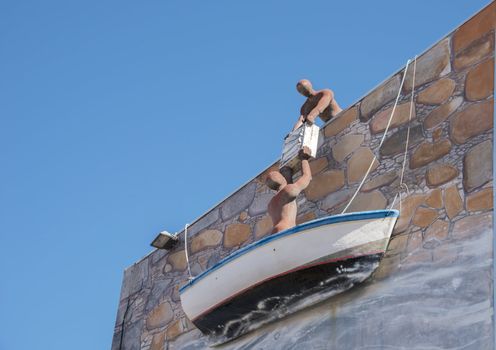 fisherman delivering the fish from the boat