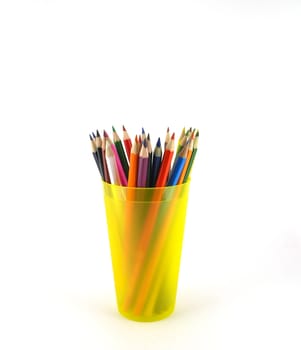 Color pencils in the yellow prop over white 