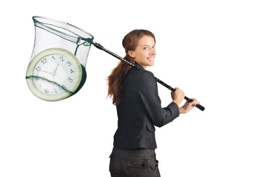 Businesswoman with net and clocks