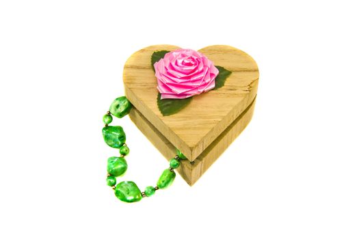 wooden heart form gift box with necklace isolated on white