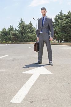 Businessman ready to start running