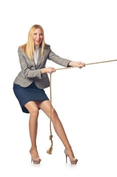 Businesswoman in tug of war concept