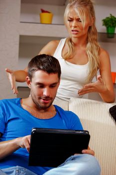 bright picture of couple with tablet PC