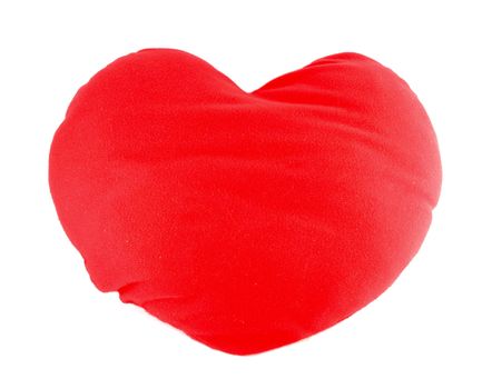 Soft red heart pillow on white background