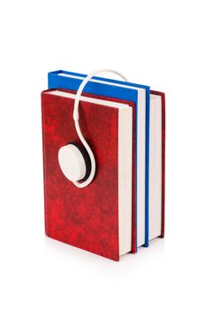 Concept of audio books with earphones on white