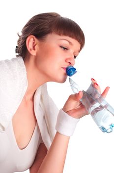 Portrait of young woman resting after sport, drink water