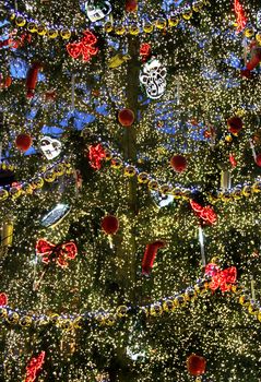 Big beautiful well decorated Christmas tree wit a lot of lights