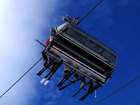 A ski lift carrying skiers.