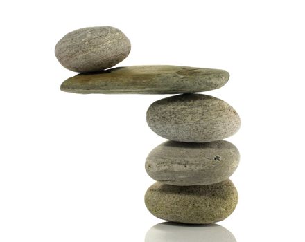 stones in perfect balance isolated on white