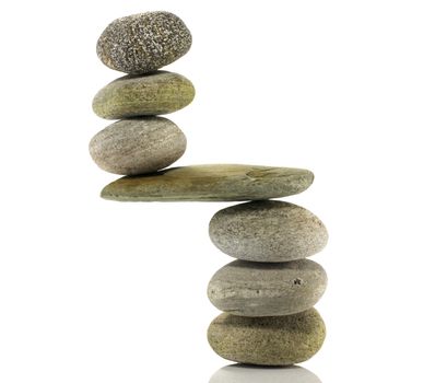 stones in perfect balance isolated on white
