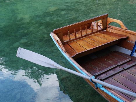 Empty boat on water