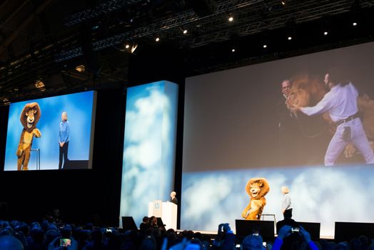 FRANKFURT – DECEMBER 4, 2012: HP president and CEO Meg Whitman delivers a keynote at HP Discover 2012 conference together with Dreamworks CEO Jeffrey Katzenberg and a cartoon character lion on December 4, 2012 in Frankfurt, Germany.