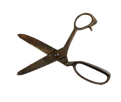 Old rusty scissors isolated on white