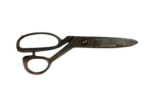 Old rusty scissors isolated on white