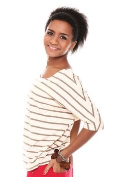 Young smiling black woman in studio isolated on a white