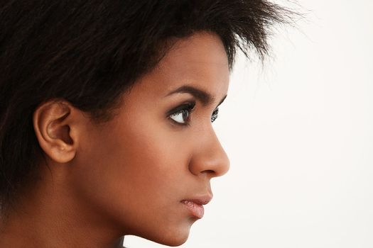 Beautiful and attractive black woman portrait isolated on a white