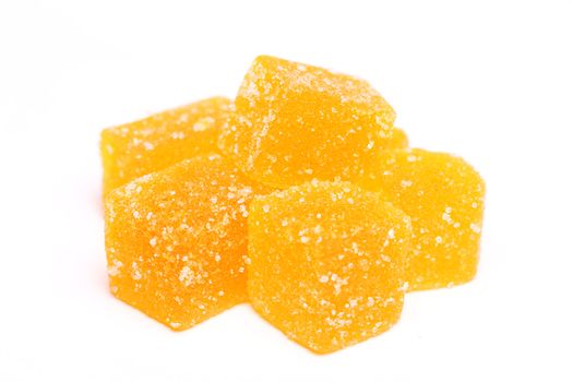 Delicious yellow marmalade isolated on a white