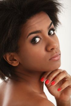 Beautiful and attractive black woman portrait isolated on a white