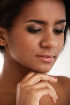 Beautiful and attractive black woman portrait isolated on a white