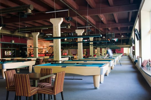 Interior picture of billiard room with tables
