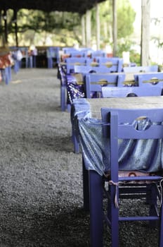 Blue chairs and tables in authentique restaurant