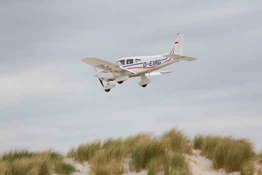 Small plane on approach at the airport on Dune (Helgoland)