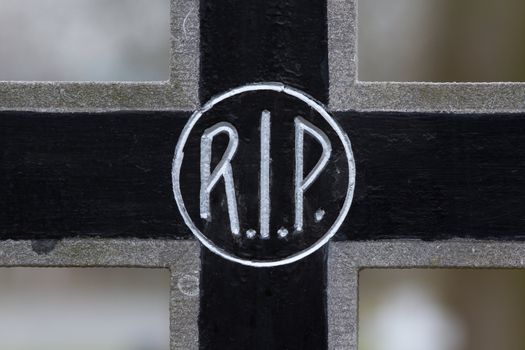 The letter RIP on an old marble grave in Holland